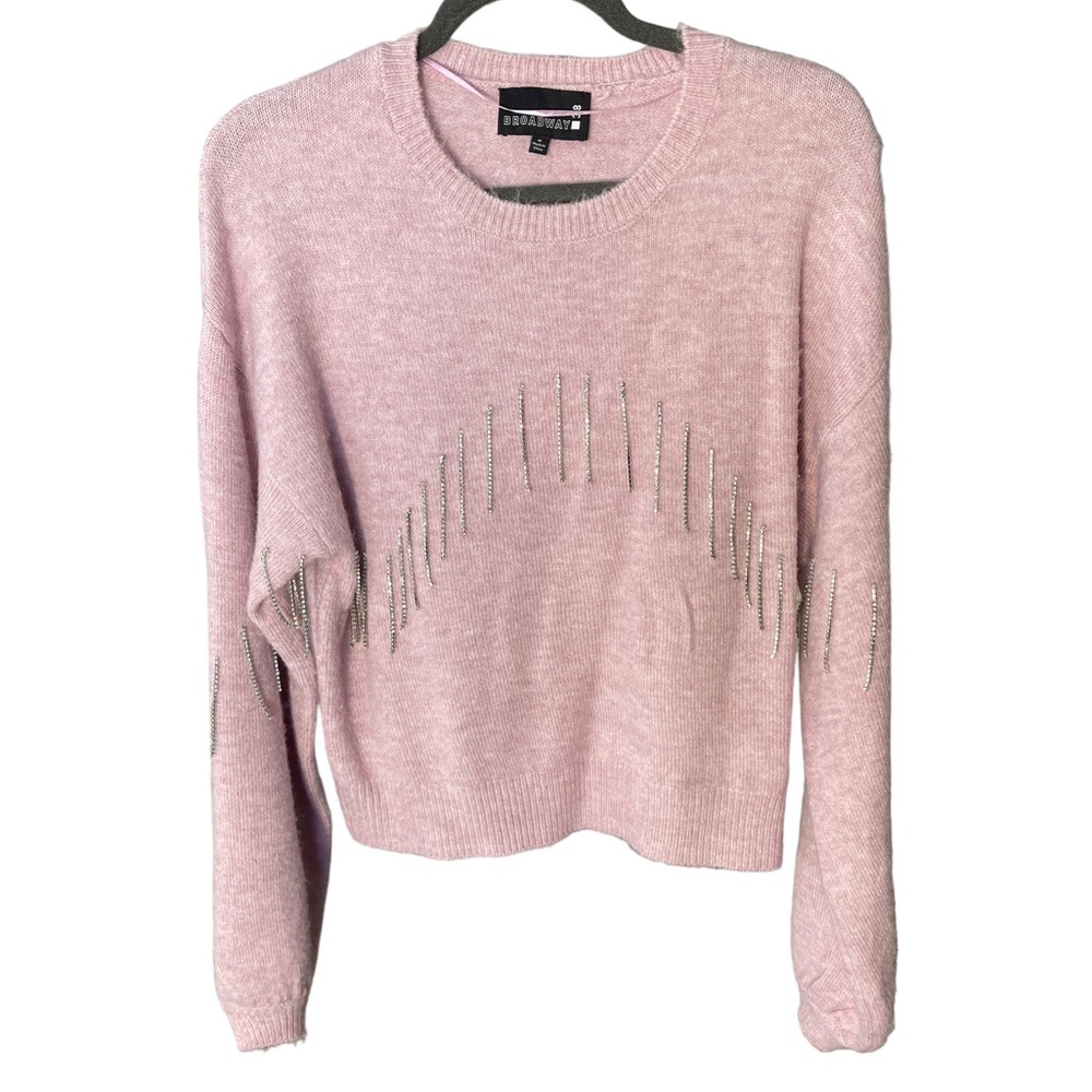 Soft purple sweater with dangling gems on the font and arms